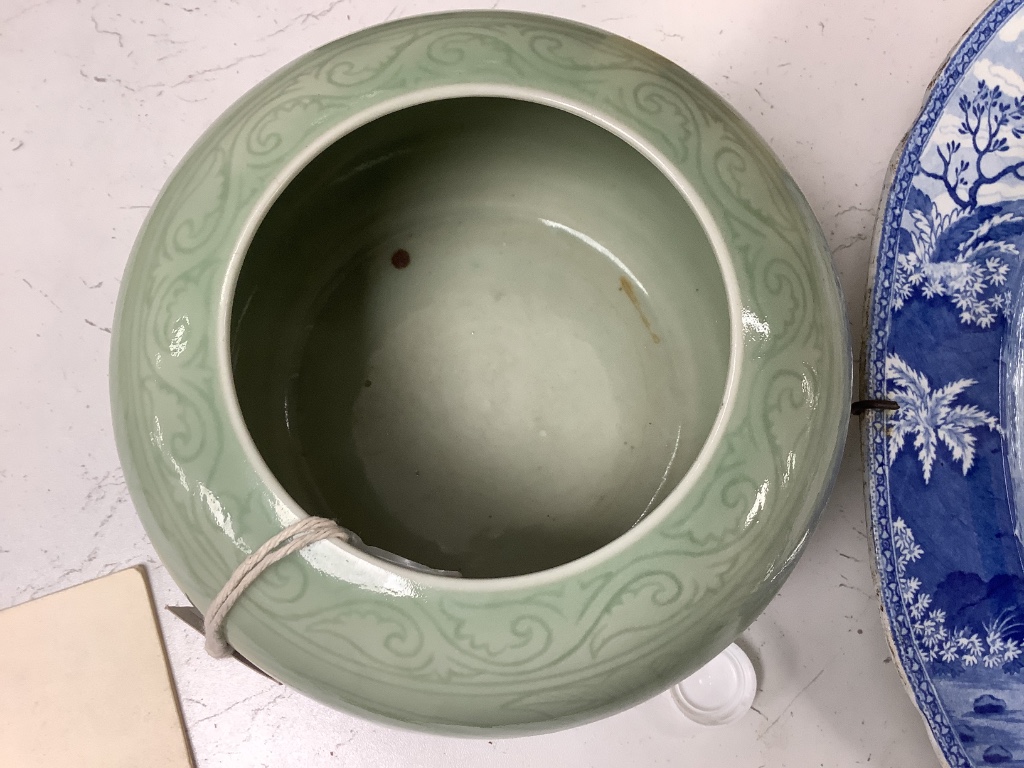 A Chinese circular celadon dish with scalloped rim, diameter 36cm, and a similar bowl, both with stands